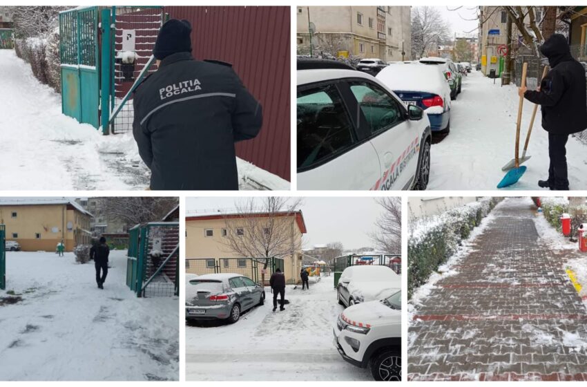  Politiștii locali bistrițeni au fost mobilizați pentru deszăpezirea căilor de acces din fața școlilor din Bistrița. FOTO